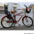 Siège enfant arrière Bellelli Pepe sur cadre vélo gris & rouge